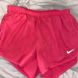 Pink Nike running shorts